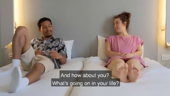 Amateur Couple Plays With Pillows In A Hotel Room